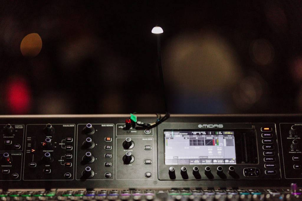 High-quality image of a Midas digital audio mixing console in a studio setting.