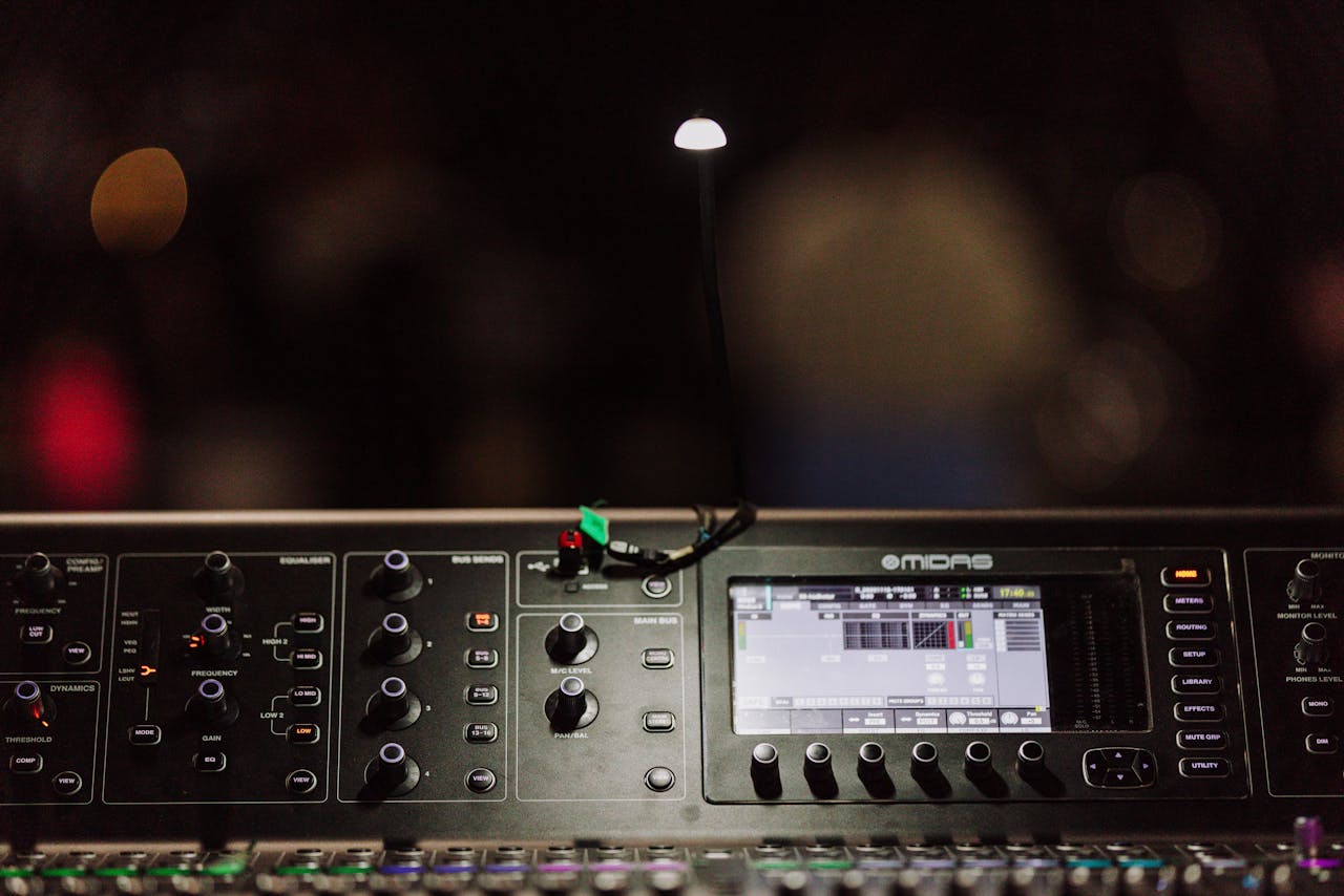 High-quality image of a Midas digital audio mixing console in a studio setting.